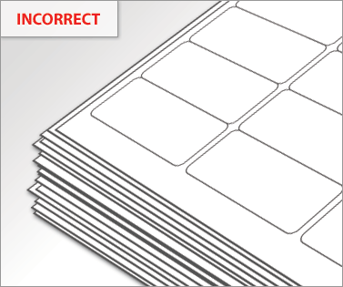 Example of how not to align sheets before placing them into your printer tray.